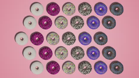 pointer arrows made of colorful donuts with sprinkles and icing on pink abstract background