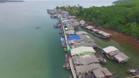 Aerial-drone-shot-of-a-traditional-Thai-fishing-village-in-Koh-Kood-,Thailand