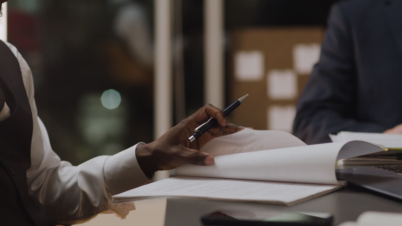 Man reading documents at the office