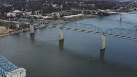 drone fly toward chattanooga tennessee walking bridge over the river downtown