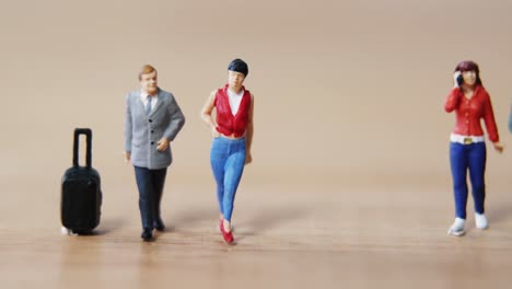 miniature couple travelling