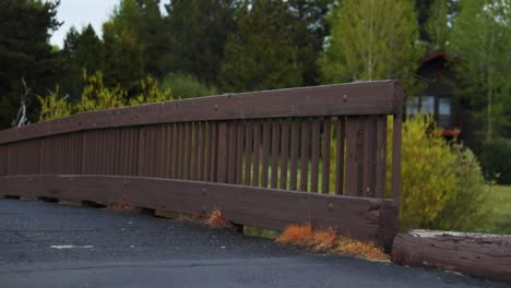 small bridge with countryside house revealed at daytime