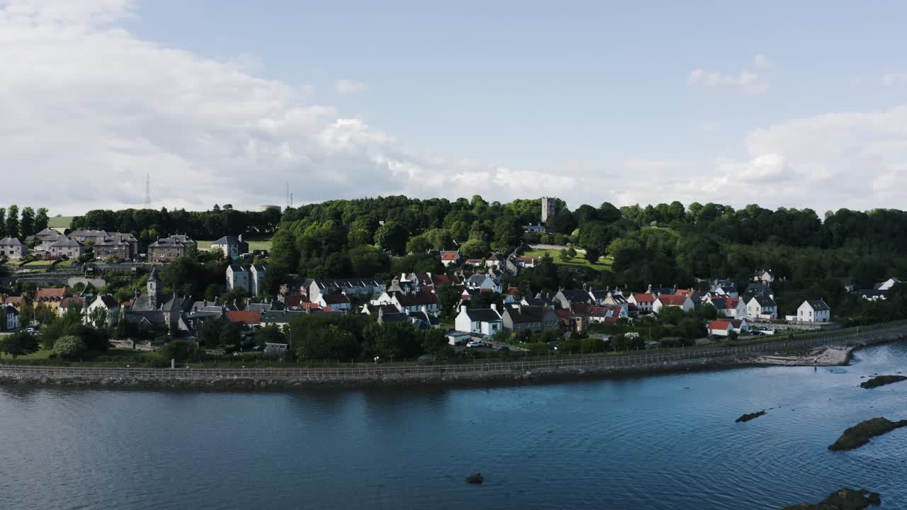 Establishing aerial view of the quaint village of Culross in Scotland's countryside