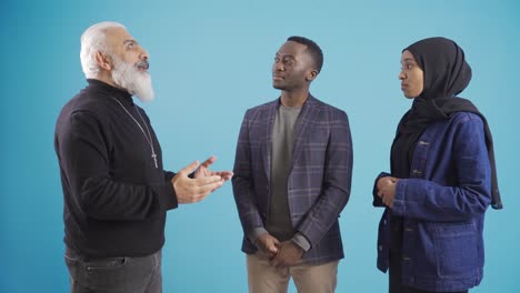 christian man and muslim african couple chatting, talking about their religious beliefs.