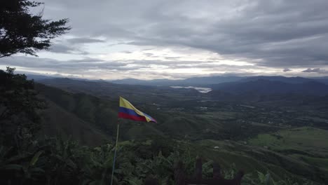 scenic viewpoint overlooking mountains and fields in rural colombia - drone shot