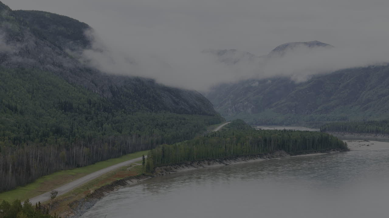 Breathtaking Alaska Highway journey through foggy peaks