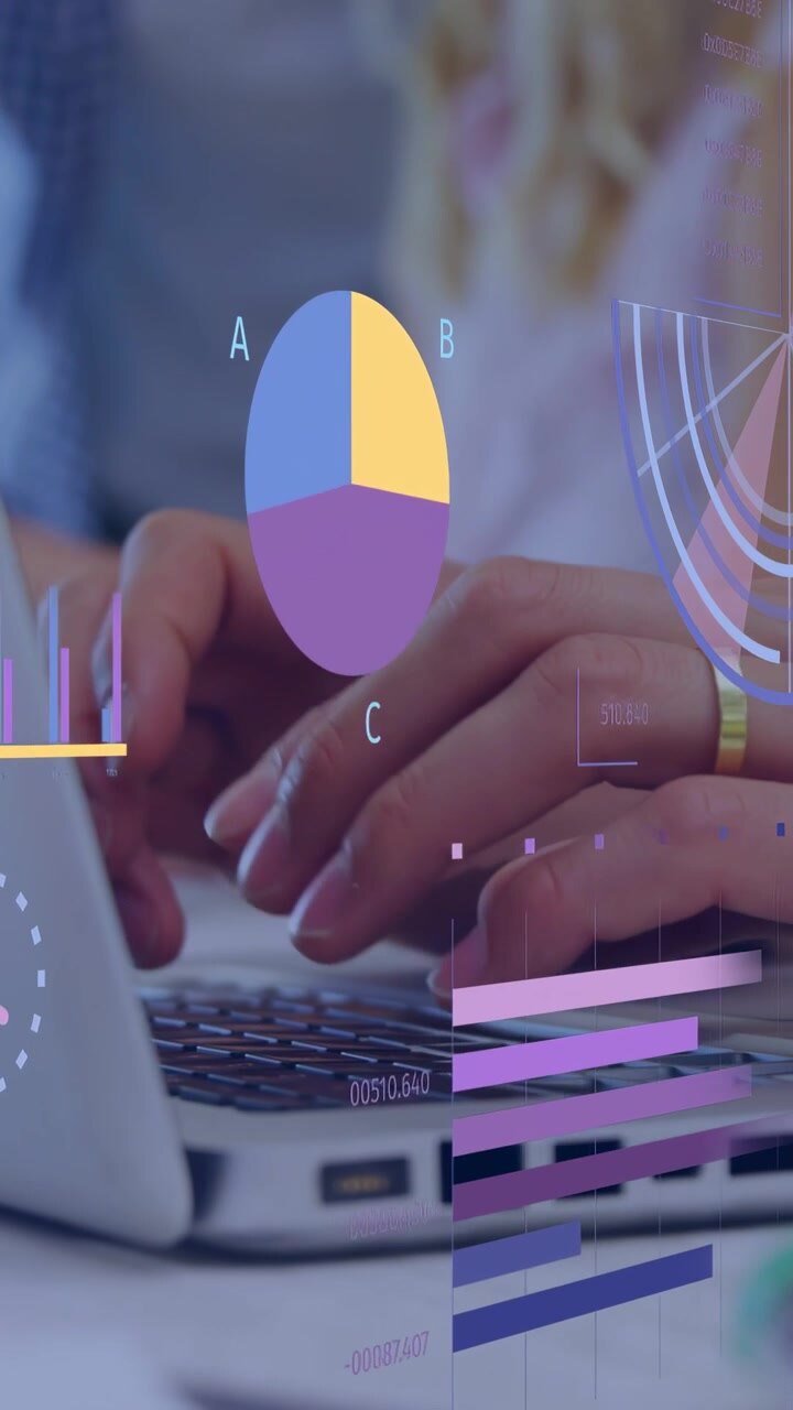 Vertical video: Team reaching keyboard, typing on laptop, animated charts overlaying for business