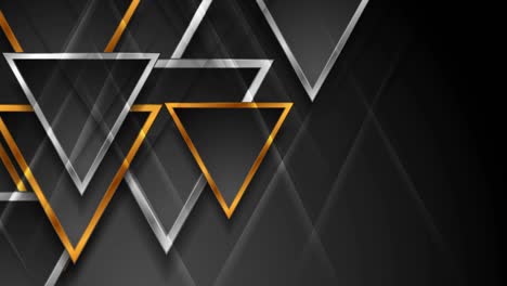triángulos brillantes dorados y plateados tecnología abstracta fondo de movimiento