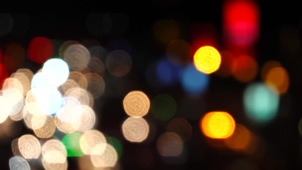 luces de la calle de la ciudad de la noche bokeh fondo abstracto