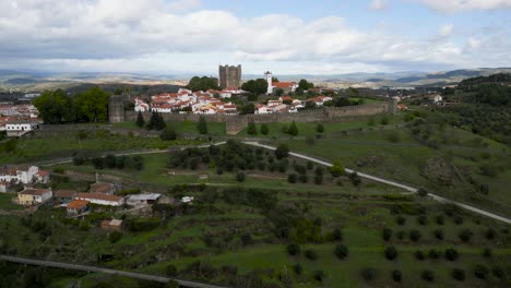 Drone-push-in-to-fortress-walls-of-medieval-castle-in-historic-city-center-of-Braganza-Portugal