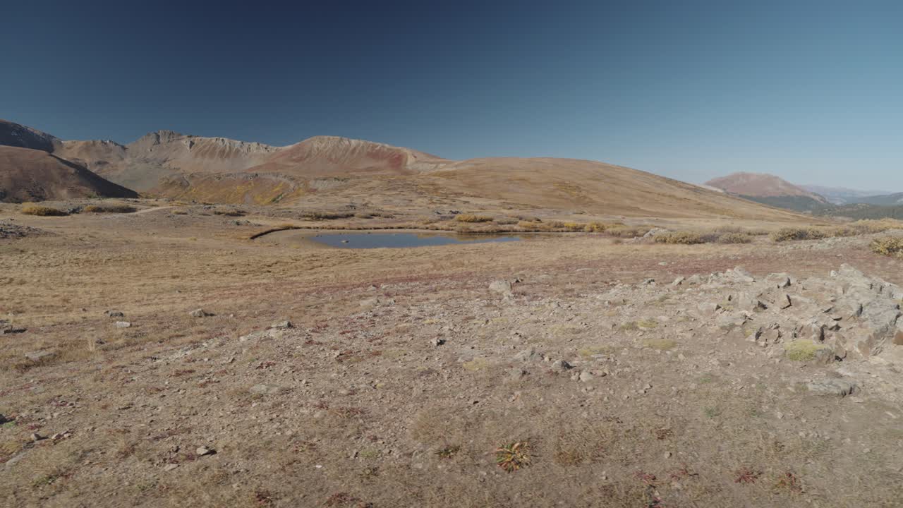 Mountainous Landscape with a Pond
