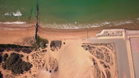 top view of an abandoned beach waves