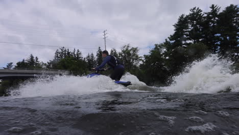 Jet-ski-rider-doing-a-wheelie-on-a-modern-trick-rig