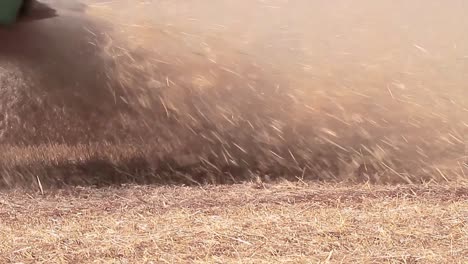 combine harvester in a field harvesting wheat stock footage