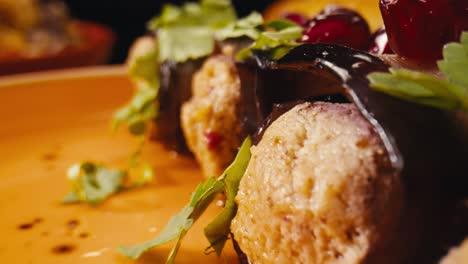 stuffed eggplant with meatballs and pomegranate