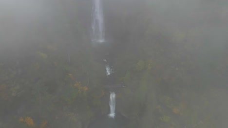 aerial view of multnomah falls covered in fog