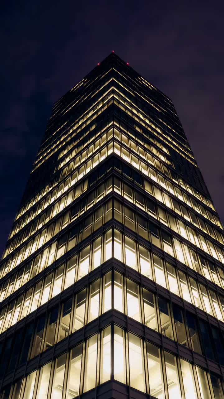 Modern Skyscraper Lit Up at Night