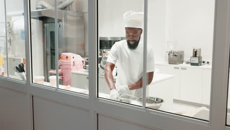 chef, man and dough on a restaurant kitchen