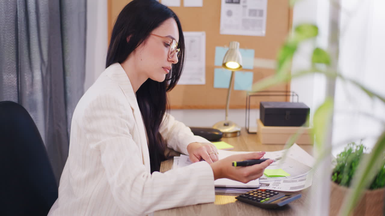 Woman Analyzing Documents and Thinking About Business Strategy