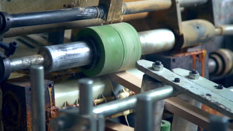 metal rollers rotating quickly in the machine. equipment for wood processing in the modern plant.