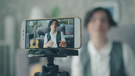 teenager vlogger recording a video