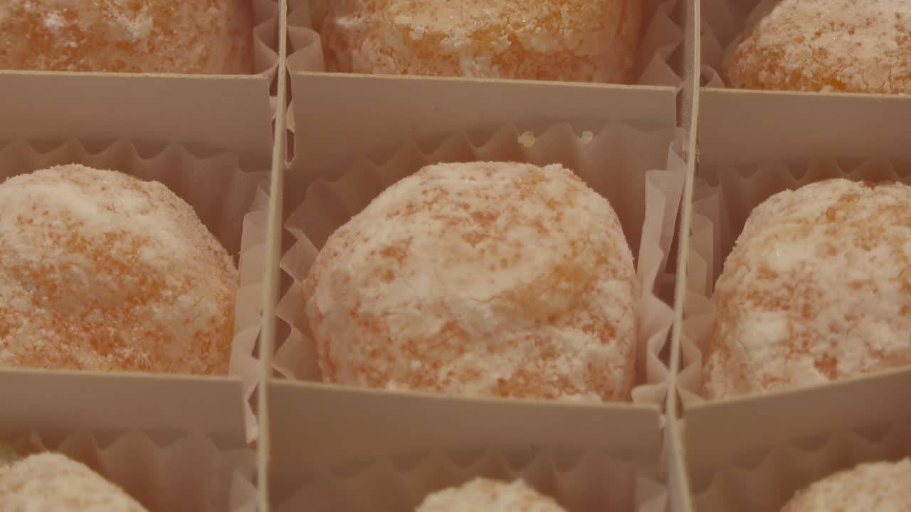 Small Orange-Colored Candies in a Box