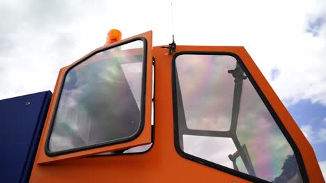 orange control box with a warning light on the roof