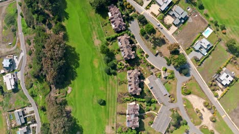 topdown view along golf course with exclusive houses condominium, santo domingo, chile