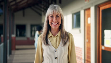 Portrait of a Smiling Older Woman in a Hallway