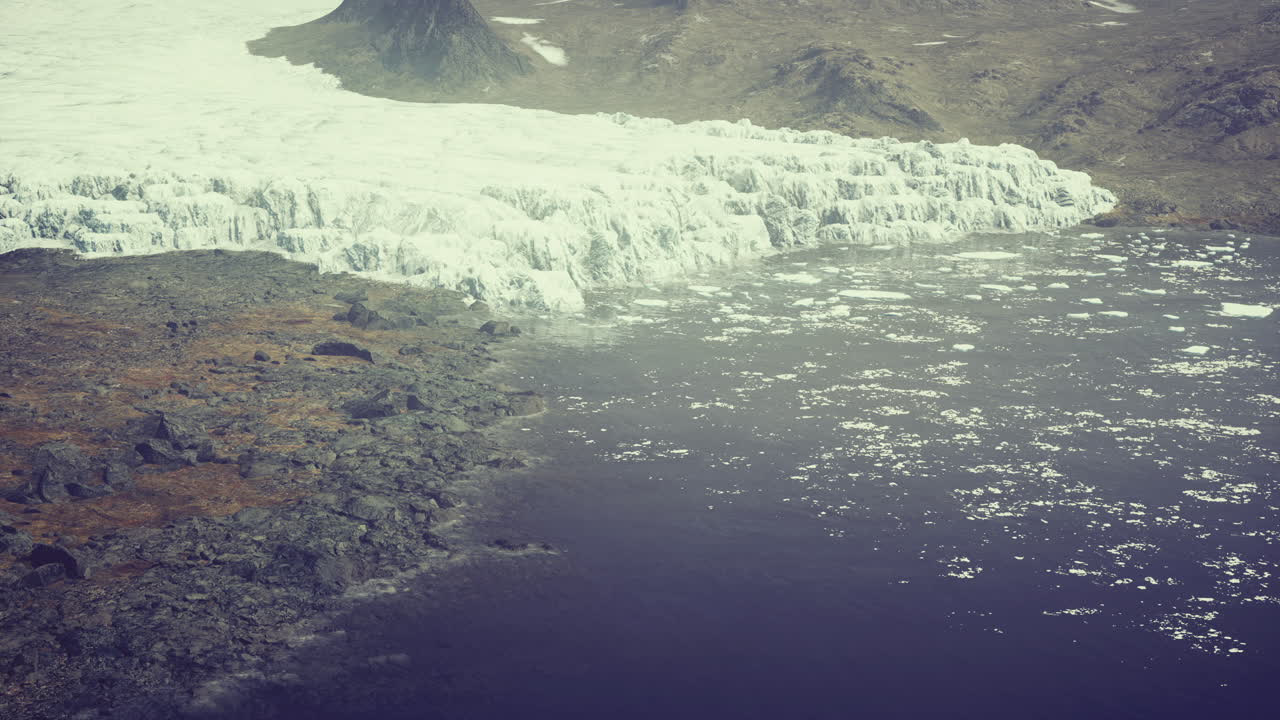 Majestic glacial landscape meeting the tranquil waters captured from above