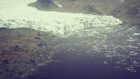 majestic glacial landscape meeting the tranquil waters captured from above