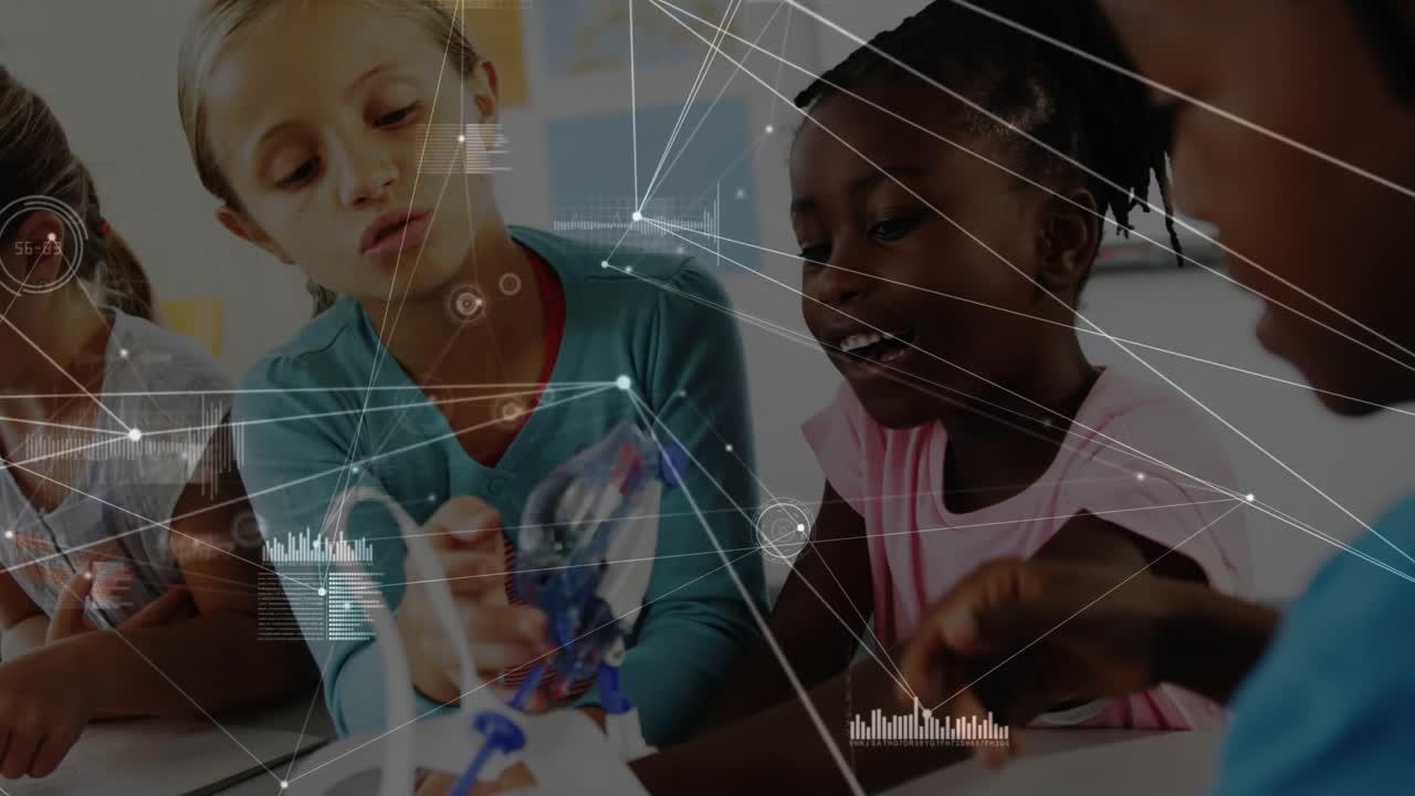Teal girl showing part, peers passing parts while HUD overlay mapping nodes across hands for STEM