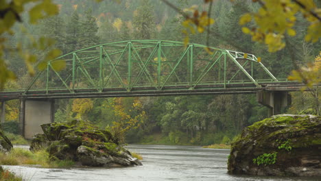 Old-green-bridge-on-a-windy-autumn-day