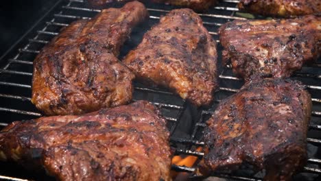 Tasty-ribs-cooking-on-barbecue-grill-for-summer-outdoor-party