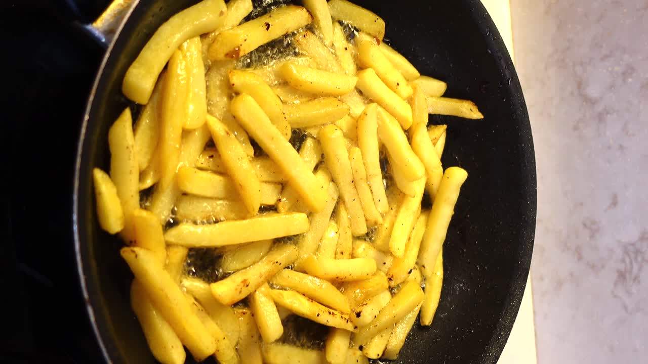 Frying French Fries in a Pan