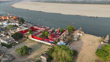 scenic drone footage capturing the daily rhythm of life along the ganges in varanasi, where ancient rituals blend seamlessly with the hustle of modern life.