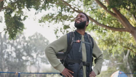 Camping,-hiking-and-black-man-with-view-of-forest