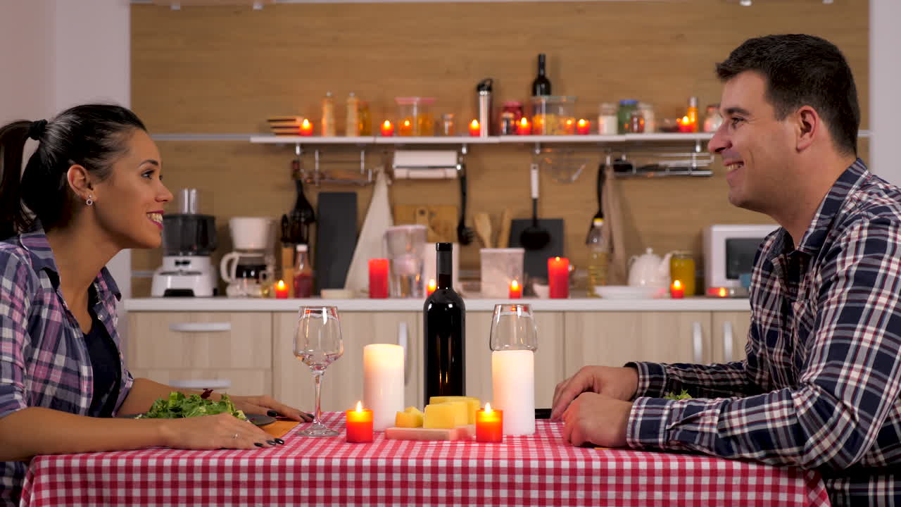 Couple Enjoying Romantic Dinner at Home