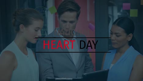 Animation-of-heart-day-over-diverse-female-and-male-coworkers-in-office