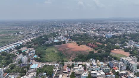 beautiful drone view of amaravathi’s peaceful rural road and green surroundings.