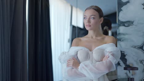 elegant woman in a beige corset dress