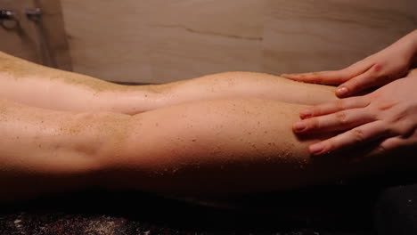 leg scrub massage at a spa