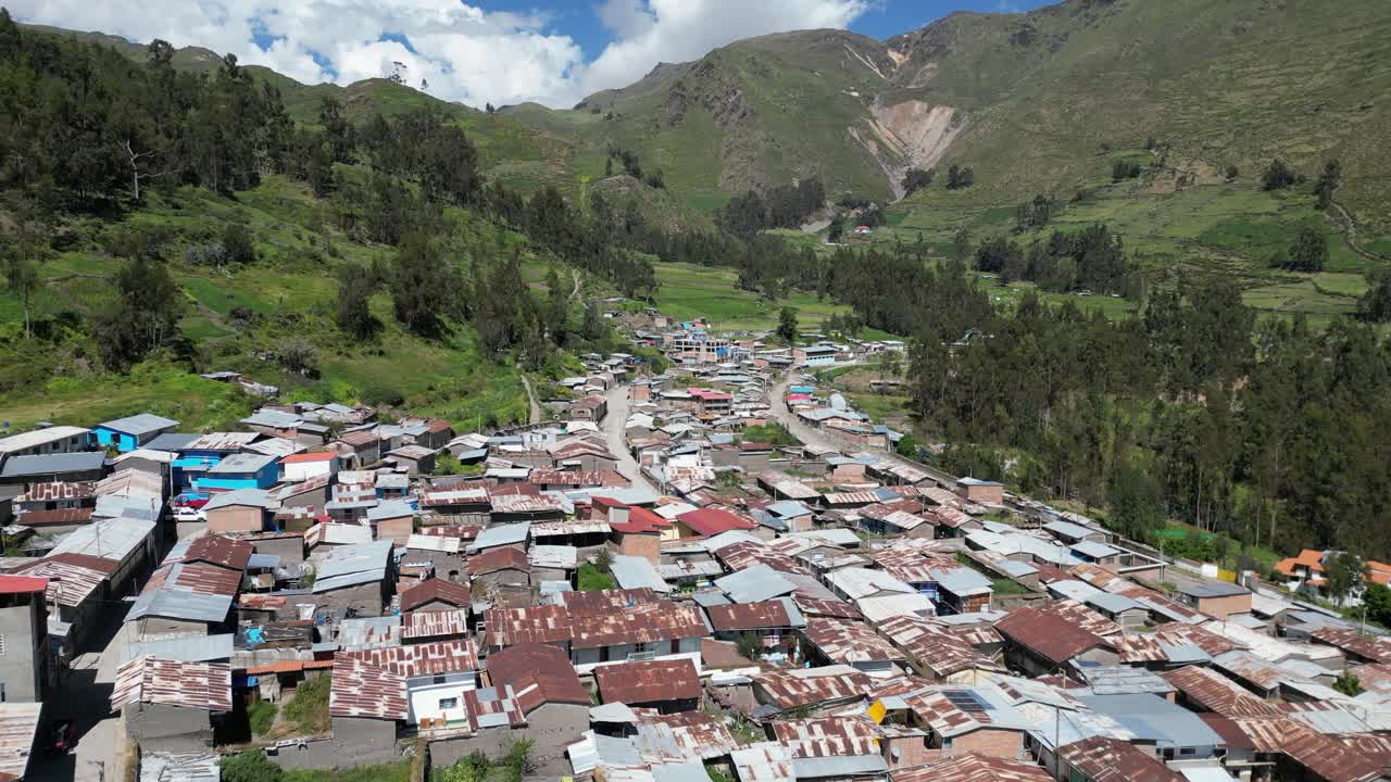 Rooftop flyover: Picturesque town of Cajatambo in Peruvian mountains