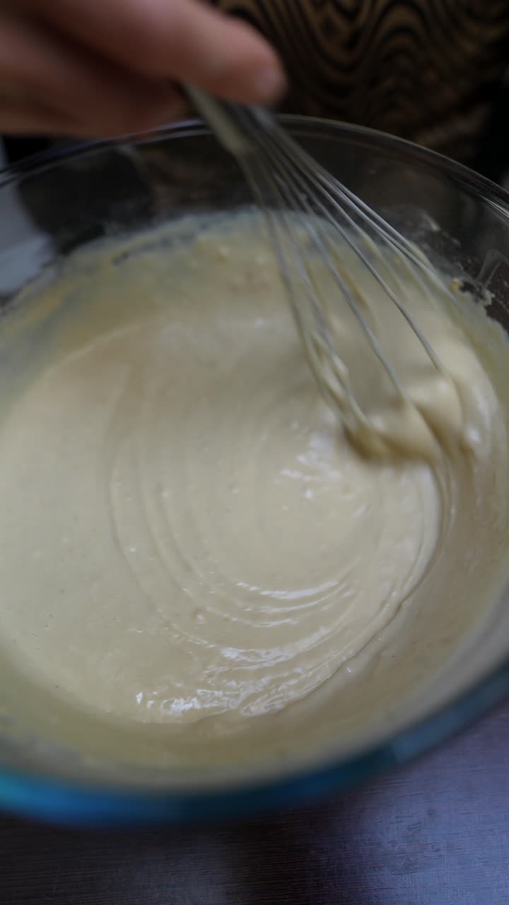Mixing Batter in a Glass Bowl