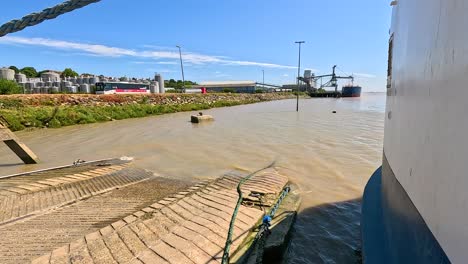 boat approaching dock in blaye, france