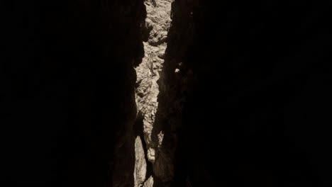 narrow canyon with sunlight shining through