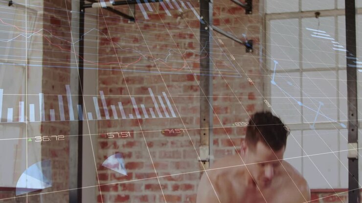 Man doing kettlebell reps in gym, starting lift to chin, pausing, HUD charts tracking strength