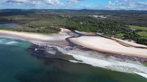 aerial view of belongil creek estuary in byron bay, new south wales, australia