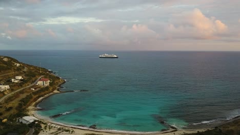 cruise ship sailing in the distance