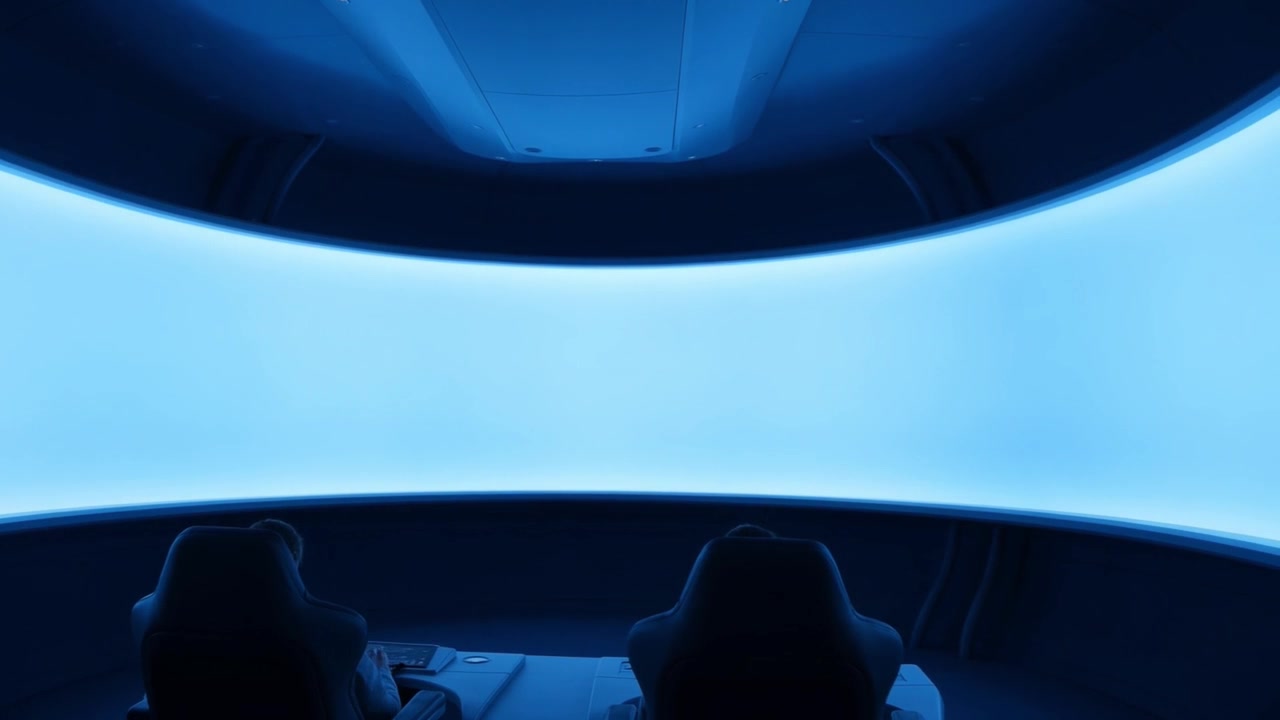 Futuristic Cockpit Interior with Empty Curved Blue Screen